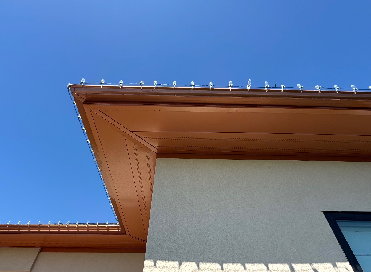 Copper seamless gutter and fascia detail installed by Pina's Roofing